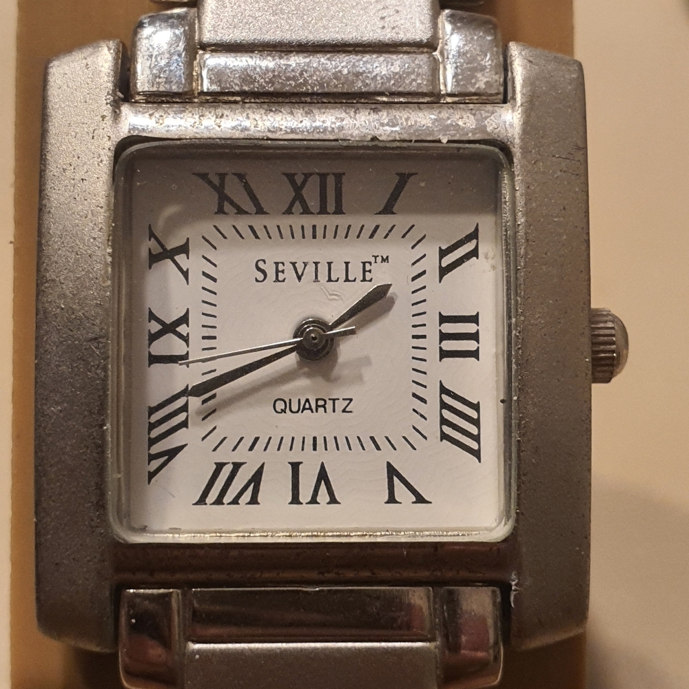 10/$20 Seville Quartz Silver/White Stainless Steel Men's Watch